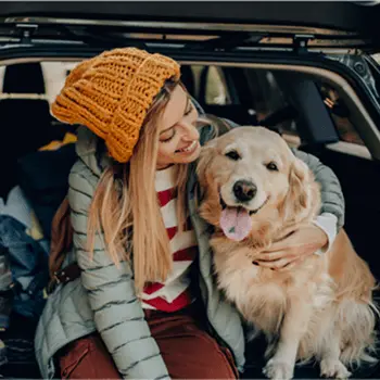 woman smiling after getting an auto loan from U.S. Bank