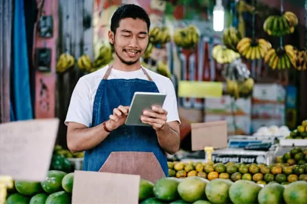 business owner checking the tablet