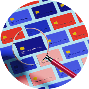 photo of a magnifying glass looking at a credit card