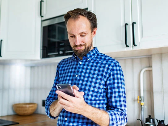 Photo of a person checking mobile