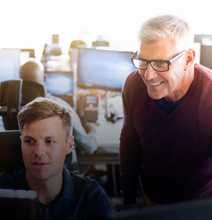 Two business people discussing financing