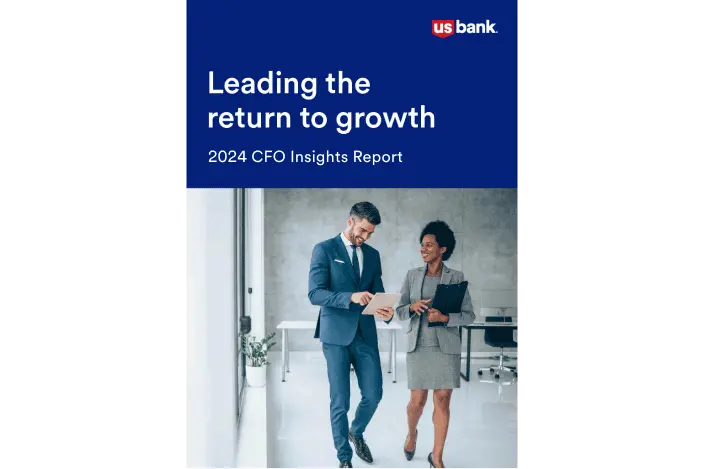 Image featuring the cover of this year’s CFO report, which shows a man and woman sitting together at in an office and looking at a laptop.