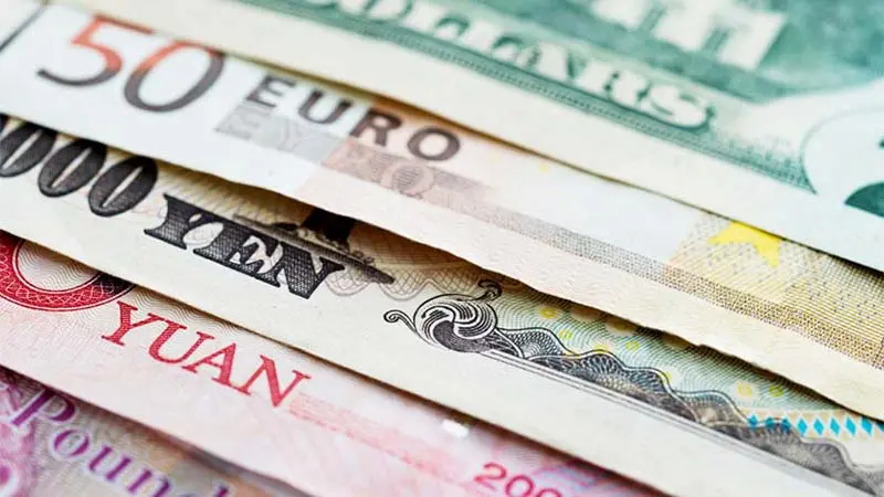 Image of different types of international currency spread out