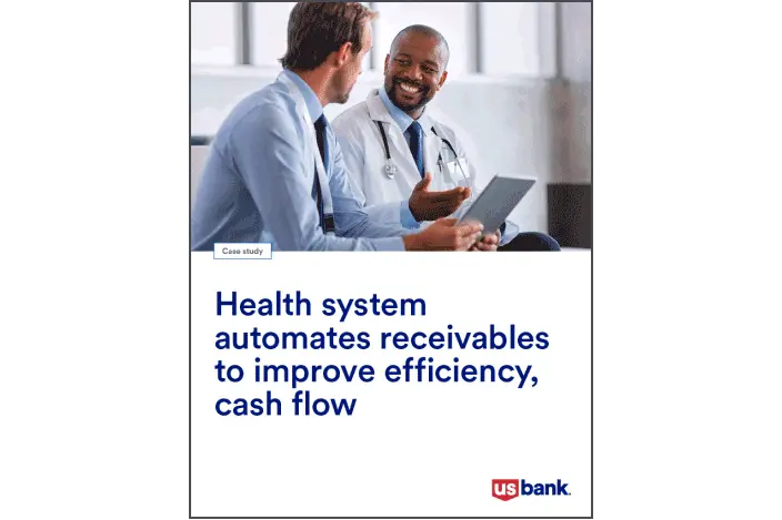 Two medical professionals talking in an office