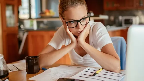 A woman reviewing her down payment plans