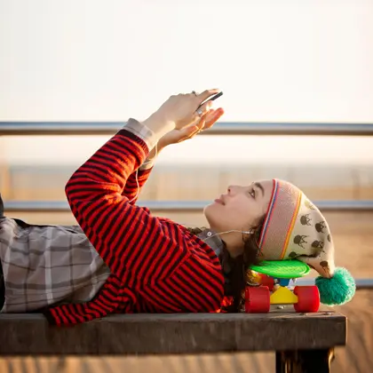Young woman looking at her phone