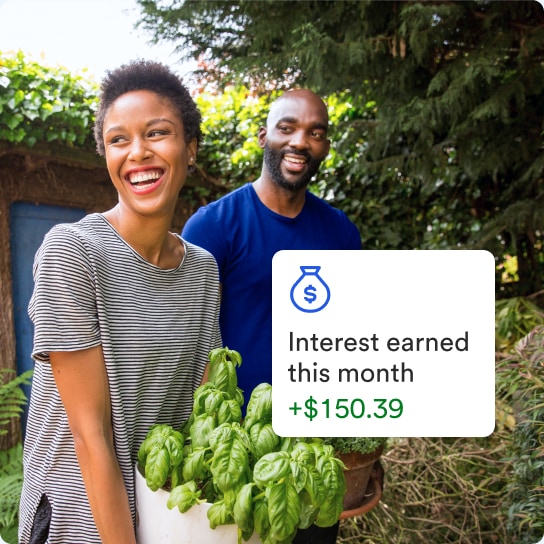 Couple living life while their money grows in an interest-bearing account