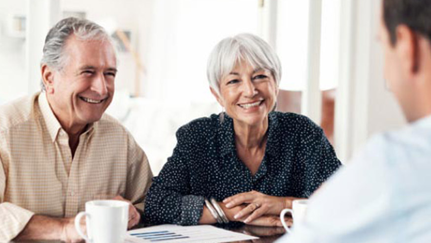 Couple meeting with their Private Wealth Management advisor