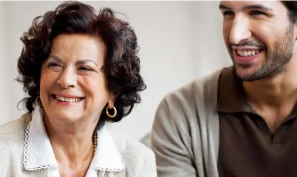 mother and son smiling 