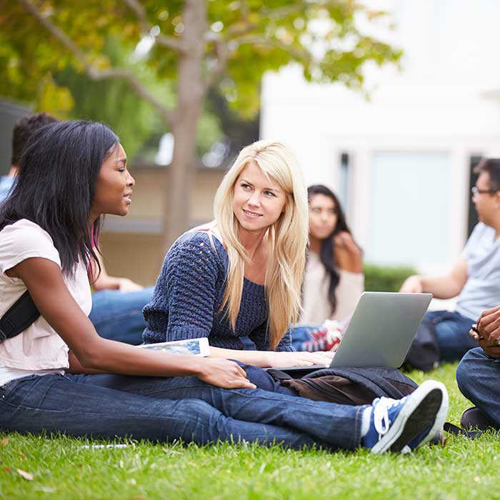 Woman reviewing Student Checking account benefits