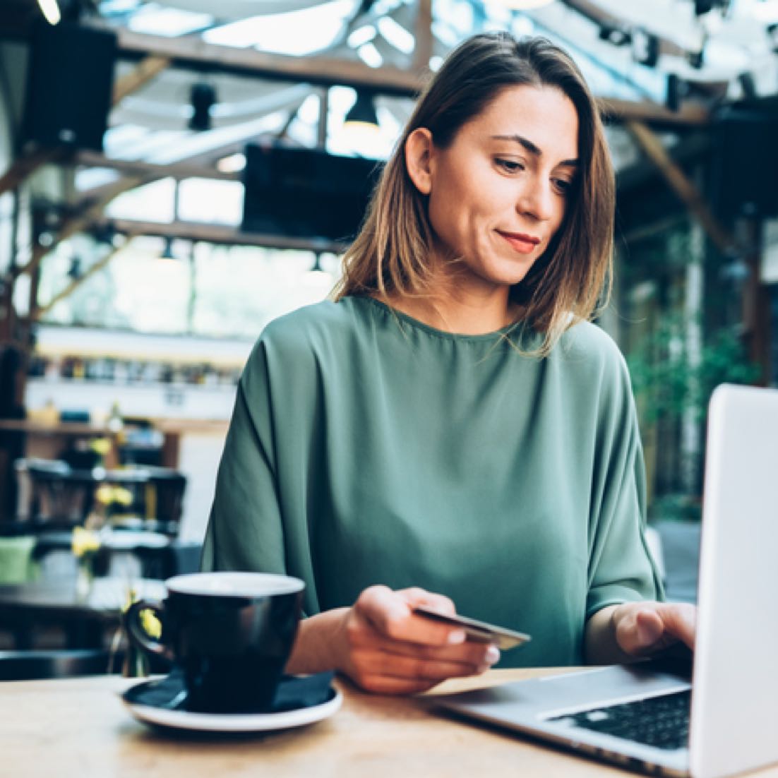 Woman reviewing accounts on laptop